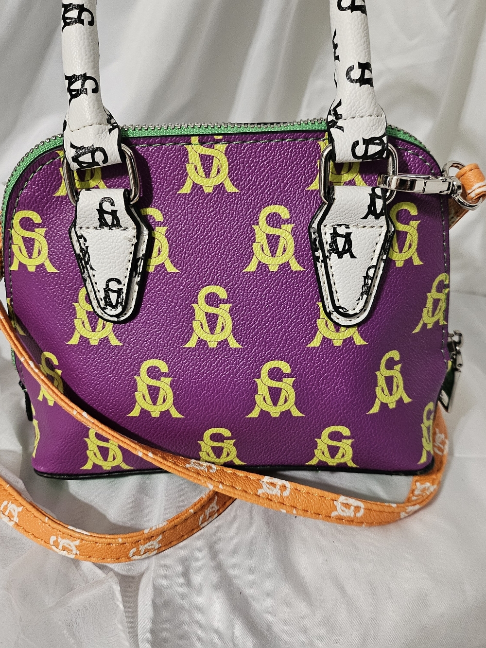 Steve Madden Purple Mini Satchel with Yellow Logo Print and Orange Strap